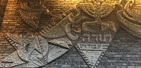 A close-up of a dollar bill Description automatically generated with low confidence